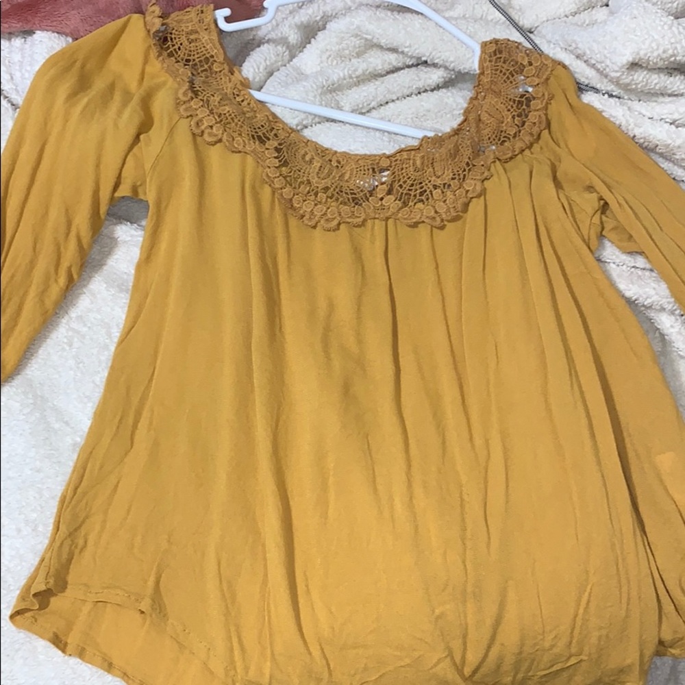 Yellow long sleeve shirt with lace around neck